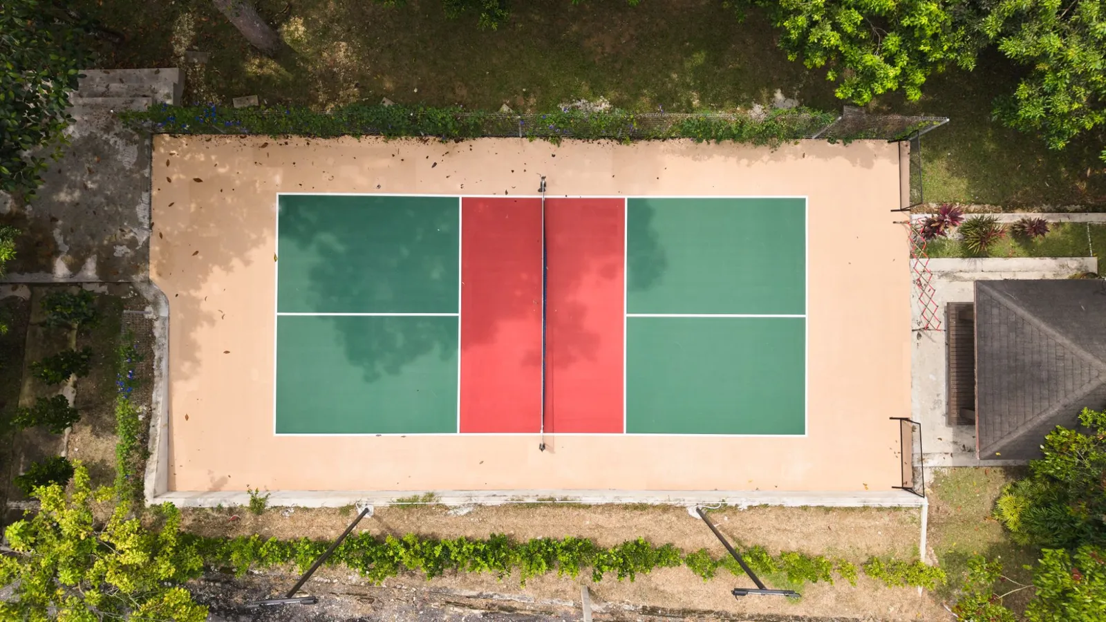 Drone view of the pickleball court among the trees